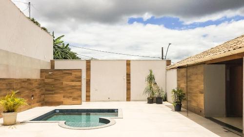 Bom Pastor House | NossoApê Guarua: Piscina | Churrasqueira | Ar-condicionado