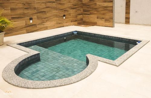 Bom Pastor House | NossoApê Guarua: Piscina | Churrasqueira | Ar-condicionado