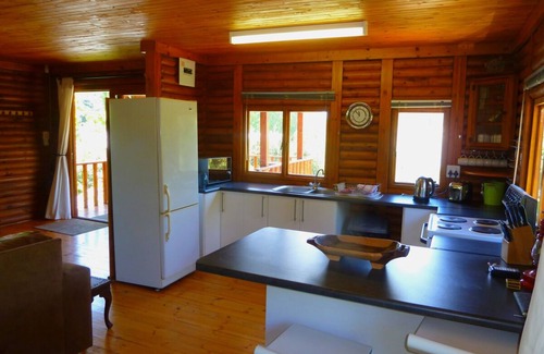 Clarens Cabin | Nougat Cabin. Luxury log cabin within walking distance of shops and restaurants.