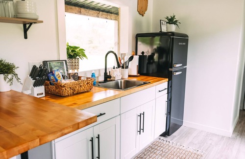 New Plymouth Cottage | Nova Cottage Tiny House Shipping Container