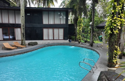 Canlubang Bed & Breakfast | Novella Tagaytay Deluxe King 302 Pond View