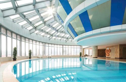 Pudong Hotel | Novotel Atlantis Shanghai - Enjoy our great-valued breakfast in our rooftop revolving restaurant with a stunning river view & utilize our FREE self-serviced laundry