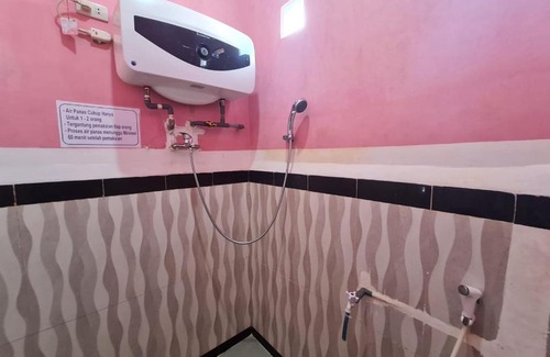 Parmonangan House | Nowly Hotel