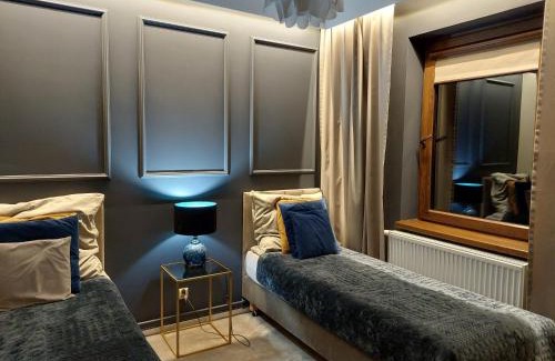 Beczkow House | Nowoczesne domki z kominkami, sauną i fotelem masującym Bayamo, Lucca, Hawana I i Hawana II