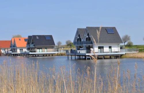 Harlesiel House | Nr 110 - Ferienhaus Seeperle Pfahlhaus auf der Harle