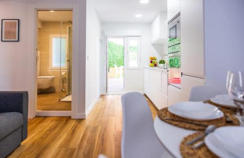 Distrito Oeste Apartment | Nuevo apartamento entre 2 playas con garaje, terraza, wifi