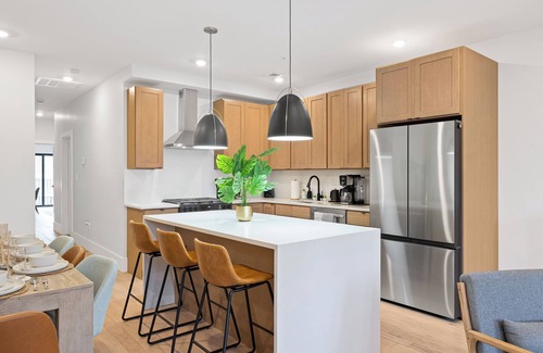 McGinley Square House | NYC Traveler's Dream: 3BR Designer Home with Quick PATH Access to Manhattan!