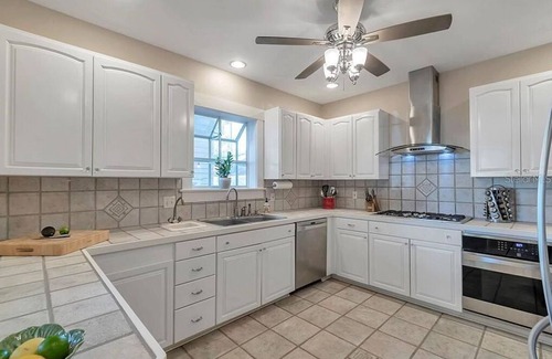 Historic Old Northeast Bed & Breakfast | Oak Room at ONE Inn, steps to Downtown St. Pete: Ideal for all guests!