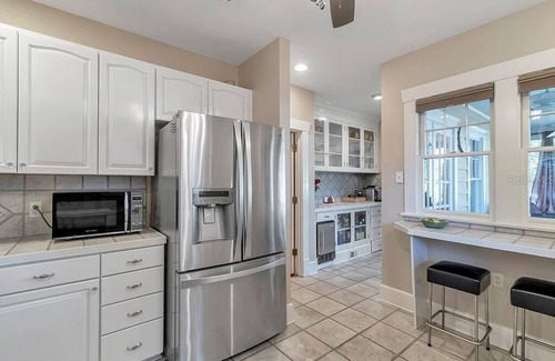 Historic Old Northeast Bed & Breakfast | Oak Room at ONE Inn, steps to Downtown St. Pete: Ideal for all guests!