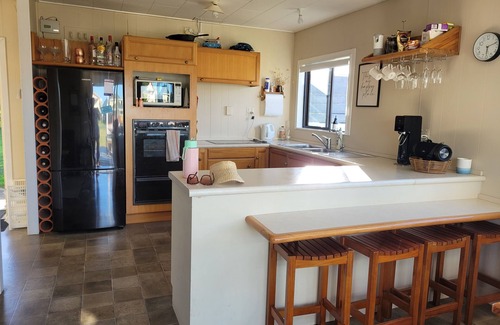 Oakura House | Oakura Family Bach, lots of room, one back from beach