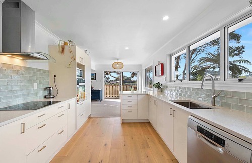 Oakura House | Oakura Oasis: Coastal Retreat by Beach