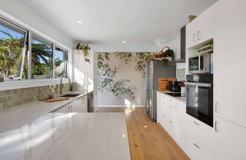 Oakura House | Oakura Oasis: Coastal Retreat by Beach