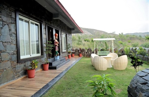 Udaipur District Villa | Oakwood by Ebony Stays – 2BHK Getaway in Udaipur with Pool & Lounge Area