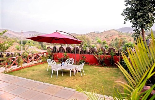 Udaipur District Villa | Oakwood by Ebony Stays – 2BHK Getaway in Udaipur with Pool & Lounge Area