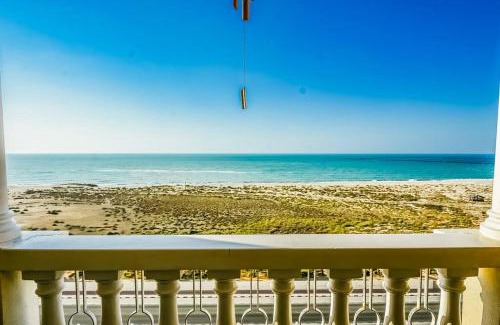 Al Hamra Village Apartment | Ocean Breeze Retreat
