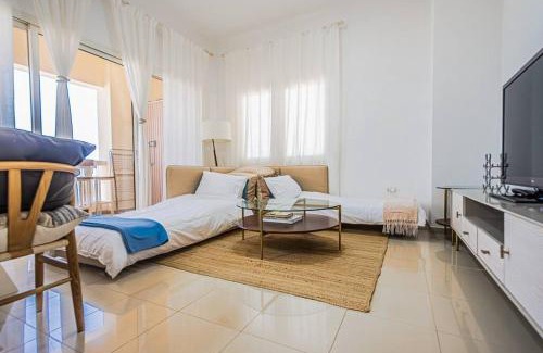 Al Hamra Village Apartment | Ocean Breeze Retreat