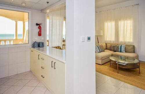 Al Hamra Village Apartment | Ocean Breeze Retreat