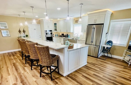 Indian Rocks Beach House | Ocean Dreaming: Waterfront Home with Heated Pool, New Dock and Amazing Sunsets!