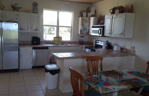 Green Turtle Cay House | OCEAN FRONT Conch Shell-Green Turtle Cay with a dock- JULY AVAILABILITY!
