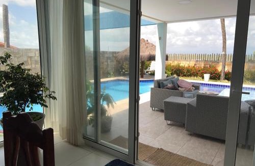 Pitangui Villa | Ocean front privacy and comfort!