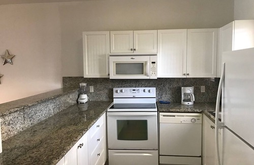 Alice Town Apartment | Ocean View , steps from the private beach 2 Bedroom Condo Up to 6 guests