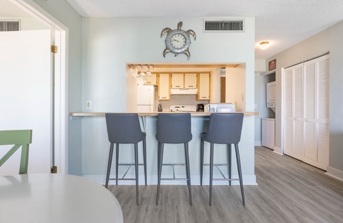 Flagler Beach Condo | Ocean-view condo with balcony, pool, tennis, & shuffleboard - near beach/golf