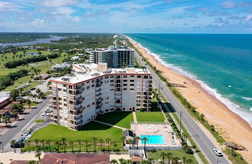 Flagler Beach Condo | Ocean-view condo with balcony, pool, tennis, & shuffleboard - near beach/golf