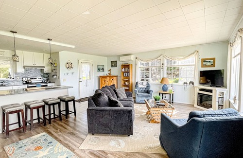 Smith River House | Ocean-view cottage with private beach access, tree house, outdoor fireplace