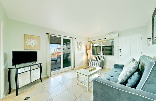 Ocean Beach Cottage | Ocean-view cottage with deck, grills, WiFi & private patio