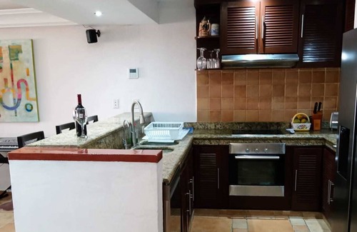 Puerto Aventuras Condo | Ocean view luxury condo with a outstanding deck