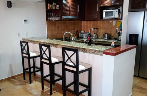 Puerto Aventuras Condo | Ocean view luxury condo with a outstanding deck