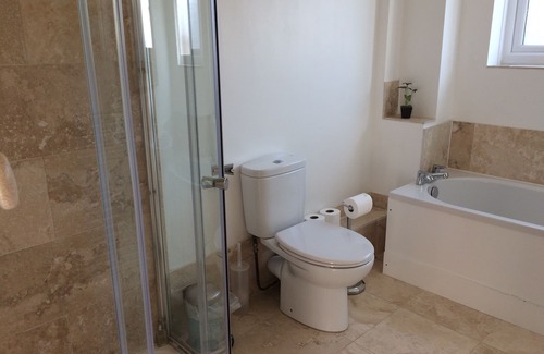 Selsey House | Ocean Views - sea views, roof terrace, enclosed garden and games room.