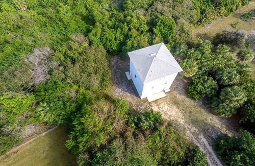 Melbourne Beach House | Ocean Views, Secluded 3 Story Home On 1/2 Acre of Palms,Self Check-in