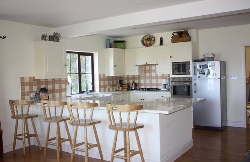 Caherdaniel House | Ocean views, walk to beach from Pairc An Dreolin on The Ring of Kerry.