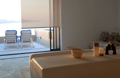 Puerto Marques Apartment | Oceanfront apartment. Great service. Beautiful private terrace with pool