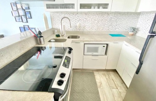 Condado Apartment | Oceanfront BalconyOcean View Condo: Beach Access, Heated Pool, Parking