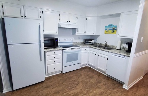 Ash Condo | Oceanfront Corner Unit with Pool & Direct Beach Access