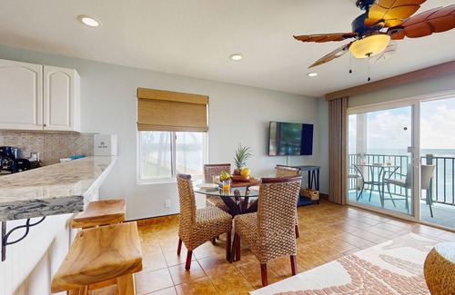 Kapaa Condo | Oceanfront condo with pool, hot tub, sauna, tennis, BBQ, putting green, & lanai