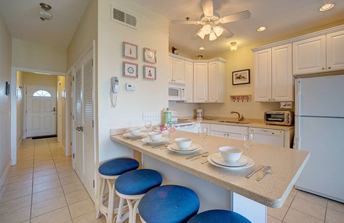 Hatteras Condo | Oceanfront cottage with ocean views, decks, hot tub, outdoor pool, washer/dryer
