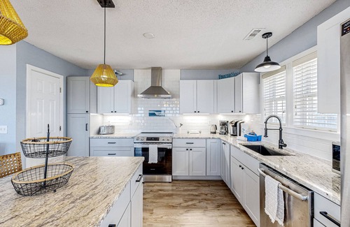 Frisco House | Oceanfront dog-friendly home with private hot tub, ocean-view sundecks, AC & W/D