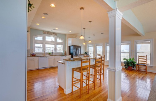 Carolina Dunes House | Oceanfront home with private heated pool complete with swim up bar and in-pool seating