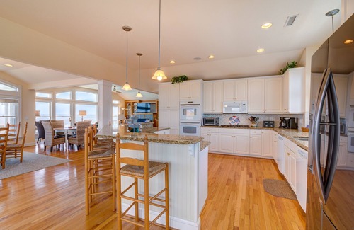 Carolina Dunes House | Oceanfront home with private heated pool complete with swim up bar and in-pool seating