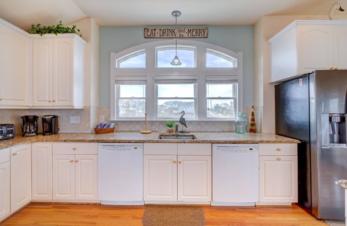 Carolina Dunes House | Oceanfront home with private heated pool complete with swim up bar and in-pool seating