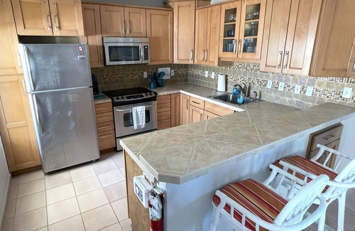 Wheeland Settlement Condo | Oceanfront Penthouse Condo — Steps to Beach, Pool & Hottub! Paradise Awaits You.