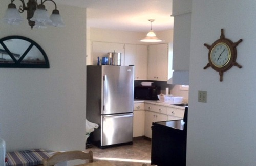 Elmira Cottage | Oceanfront - Sea Seekers - Bed by the Ocean
