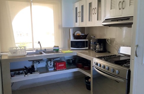 Zona Hotelera Condo | Oceanfront white sand beach condo