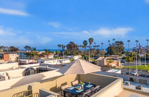 Del Obispo Apartment | Oceanview rooftop deck, pool, hot tub | Doho Haus