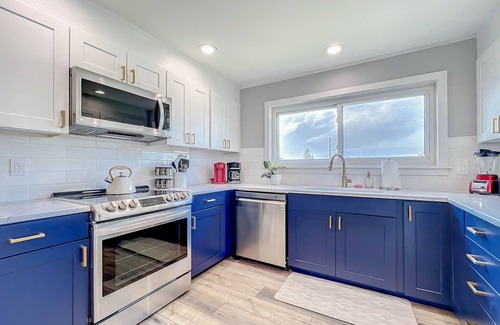 Sea Dunes Condo | Octopus Garden, A Luxurious Townhome Overlooking Pool! Ocean Views!