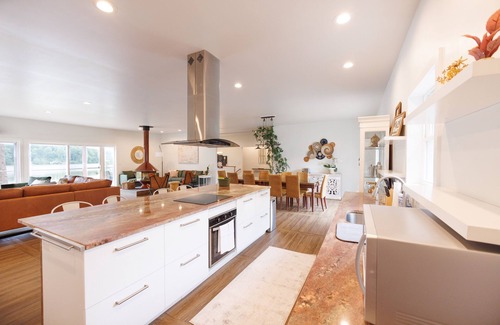 Orange House | Ojoy Cove Charming Waterfront Retreat 5 Bedroom Home by RedAwning