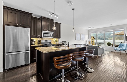 Westbank Condo | Okanagan Lake Beachfront Penthouse. 2 Bedrooms + den, 3 bath. Boatslip Option.